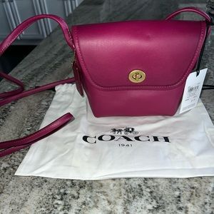 Plum coach purse